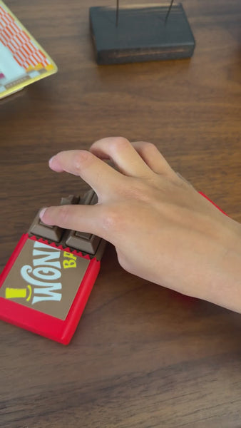 Chocolate bar clicker fidget toy breaking and clicking, video demo